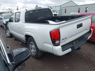 2022 Toyota Tacoma SR with VIN 3TMCZ5ANXNM457736, listed as a IAAI auction lot 41708016 with 44,351 mi miles and . Bid and sale history available at DreamBid. Image 3.