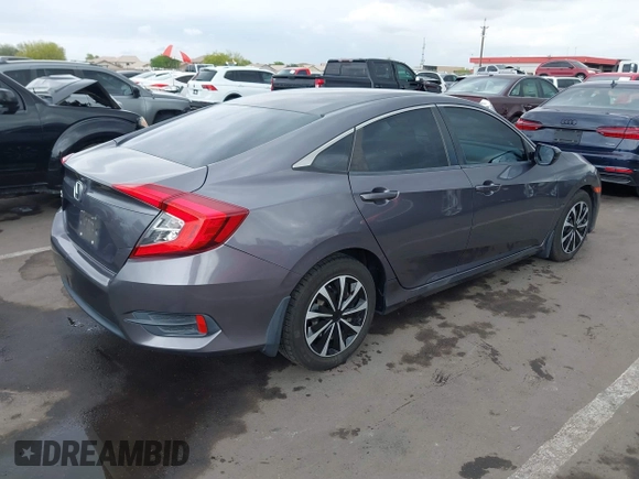 2017 Honda Civic LX with VIN 19XFC2F50HE055888, listed as a IAAI auction lot 42202494 with 147,354 mi miles and . Bid and sale history available at DreamBid. Image 4.