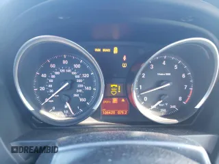 2011 BMW Z4 sDrive30i with VIN WBALM5C5XBE379064, listed as a Copart auction lot 87475414 with 105,420 mi miles and Salvage Title. Bid and sale history available at carsss.com. Image 9.