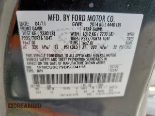 2011 Ford Escape XLS with VIN 1FMCU0C79BKC04115, listed as a Copart auction lot 56982375 with 193,078 mi miles and Salvage title. Bid and sale history available at DreamBid. Image 13.