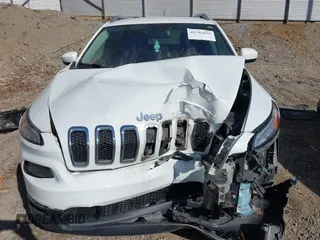 2015 Jeep Cherokee Latitude with VIN 1C4PJMCS7FW503594, listed as a IAAI auction lot 41792820 with 77,325 mi miles. Bid and sale history available at carsss.com. Image 12.