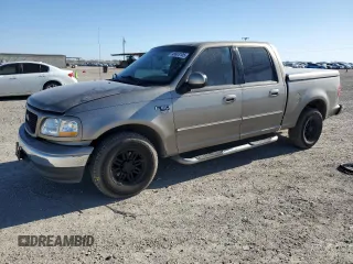 2003 Ford F-150 XLT with VIN 1FTRW07623KB92840, listed as a Copart auction lot 48603105 with 145,516 mi miles and Salvage Title. Bid and sale history available at carsss.com. Image 1.