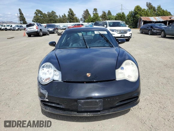 2004 Porsche 911 with VIN WP0BA29944S635185, listed as a Copart auction lot 56973225 with 90,005 mi miles and Salvage title. Bid and sale history available at DreamBid. Image 5.