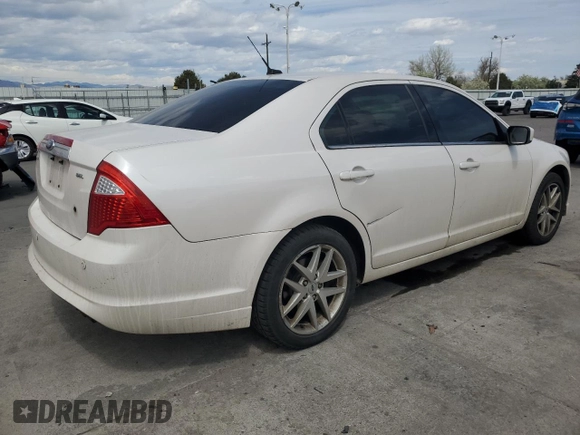 2012 Ford Fusion SEL z VIN 3FAHP0JAXCR282521, wystawiony jako Copart lot #53115505 z przebiegiem 96 833 mil mil oraz Szkoda całkowita • Salvage title. Historia ofert i sprzedaży dostępna na DreamBid. Obrazek 3.