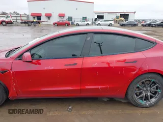 2021 Tesla Model 3 Long Range with VIN 5YJ3E1EB2MF079595, listed as a IAAI auction lot 41621546 with 45,616 mi miles. Bid and sale history available at carsss.com. Image 14.