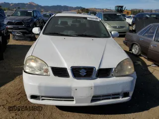 2004 Suzuki Forenza S z VIN KL5JD52Z14K950658, wystawiony jako Copart lot #74824154 z przebiegiem 99 150 mil mil oraz Tytuł czysty. Historia ofert i sprzedaży dostępna na DreamBid. Obrazek 5.