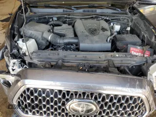 2019 Toyota Tacoma SR z VIN 3TMCZ5AN8KM197011, wystawiony jako Copart lot #56198675 z przebiegiem 117 363 mil mil oraz Szkoda całkowita • Salvage title. Historia ofert i sprzedaży dostępna na DreamBid. Obrazek 11.