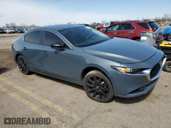 2022 Mazda 3 Carbon Edition with VIN 3MZBPACL3NM314887, listed as a Copart auction lot 51631935 with Not provided miles and Salvage title. Bid and sale history available at DreamBid. Image 4.