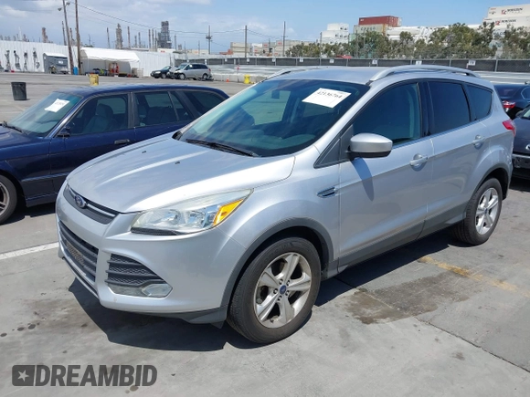 2016 Ford Escape SE with VIN 1FMCU0GX7GUB72822, listed as a IAAI auction lot 42136764 with 98,497 mi miles. Bid and sale history available at carsss.com. Image 2.