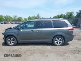 2011 Toyota Sienna LE AAS with VIN 5TDKK3DC7BS014356, listed as a IAAI auction lot 42137928 with 198,400 mi miles and . Bid and sale history available at DreamBid. Image 14.