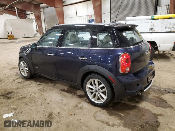 2013 MINI Countryman S ALL4 with VIN WMWZC5C5XDWM16477, listed as a Copart auction lot 51666385 with 112,383 mi miles and Salvage title. Bid and sale history available at DreamBid. Image 2.
