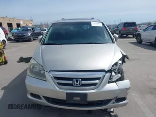 2006 Honda Odyssey EX-L z VIN 5FNRL38736B089963, wystawiony jako IAAI lot #41858061 z przebiegiem 178 845 mil mil oraz . Historia ofert i sprzedaży dostępna na DreamBid. Obrazek 12.