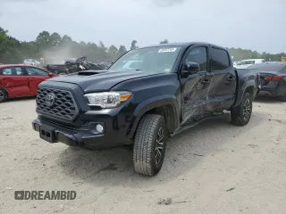 2020 Toyota Tacoma SR5 with VIN 3TMAZ5CN1LM115383, listed as a Copart auction lot 59597245 with 64,852 mi miles and Salvage title. Bid and sale history available at DreamBid. Image 1.