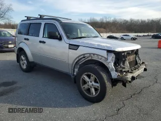 2009 Dodge Nitro SXT with VIN 1D8GU28K19W545432, listed as a Copart auction lot 86243914 with 144,577 mi miles and Salvage Title. Bid and sale history available at DreamBid. Image 4.