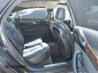 2011 Audi A8 with VIN WAURVAFD9BN014362, listed as a IAAI auction lot 41960366 with 135,244 mi miles and . Bid and sale history available at DreamBid. Image 8.