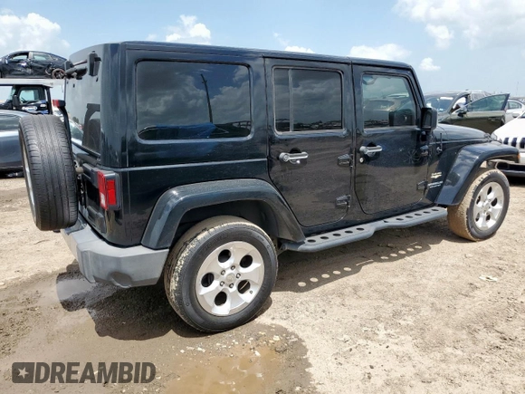 2015 Jeep Wrangler Unlimited Sahara with VIN 1C4BJWEG4FL668339, listed as a Copart auction lot 61221325 with 117,887 mi miles and Salvage title. Bid and sale history available at DreamBid. Image 3.
