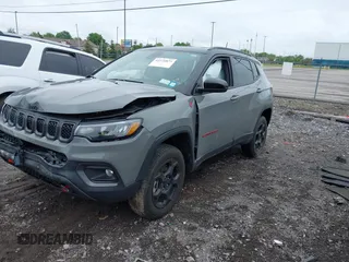 2023 Jeep Compass Trailhawk with VIN 3C4NJDDNXPT562694, listed as a IAAI auction lot 42370873 with 21,988 mi miles and . Bid and sale history available at DreamBid. Image 2.