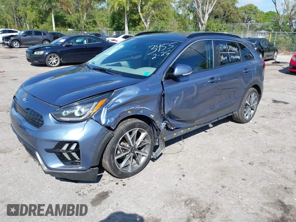 2021 Kia Niro Touring with VIN KNDCC3LC3M5483455, listed as a IAAI auction lot 41678795 with 132,216 mi miles. Bid and sale history available at carsss.com. Image 17.
