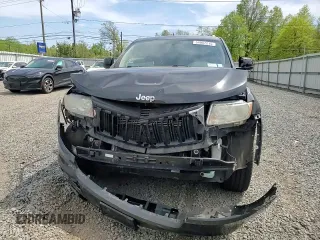 2011 Jeep Grand Cherokee Laredo z VIN 1J4RR4GG8BC738468, wystawiony jako Copart lot #54907215 z przebiegiem 182 576 mil mil oraz Szkoda całkowita • Salvage title. Historia ofert i sprzedaży dostępna na DreamBid. Obrazek 14.