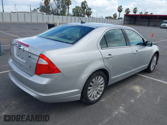 2010 Ford Fusion Hybrid with VIN 3FADP0L37AR261099, listed as a IAAI auction lot 41903543 with 160,070 mi miles. Bid and sale history available at carsss.com. Image 4.