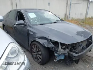 2019 Kia Optima LX z VIN 5XXGT4L38KG319215, wystawiony jako IAAI lot #42226251 z przebiegiem 70 449 mil mil oraz . Historia ofert i sprzedaży dostępna na DreamBid. Obrazek 1.