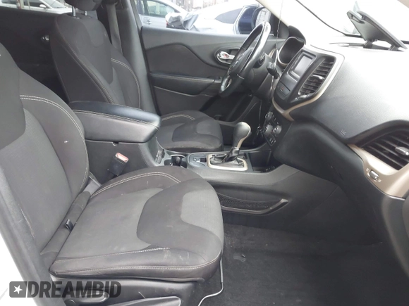 2015 Jeep Cherokee Latitude with VIN 1C4PJLCB5FW642701, listed as a IAAI auction lot 42063262 with 142,501 mi miles and . Bid and sale history available at carsss.com. Image 5.