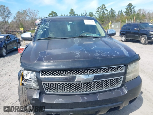 2013 Chevrolet Suburban LT with VIN 1GNSCJE07DR147780, listed as a IAAI auction lot 41666746 with 260,020 mi miles and . Bid and sale history available at DreamBid. Image 12.