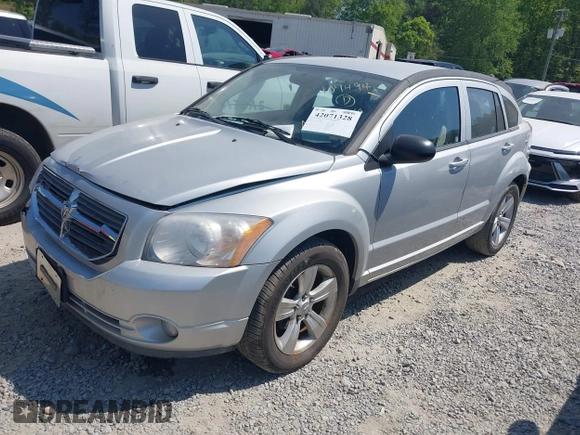 2011 Dodge Caliber Mainstreet with VIN 1B3CB3HAXBD107494, listed as a IAAI auction lot 42071328 with 146,936 mi miles. Bid and sale history available at carsss.com. Image 2.