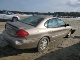 2003 Ford Taurus SEL Deluxe with VIN 1FAHP56SX3A243775, listed as a Copart auction lot 72245394 with 251,041 mi miles and Salvage Title. Bid and sale history available at DreamBid. Image 3.