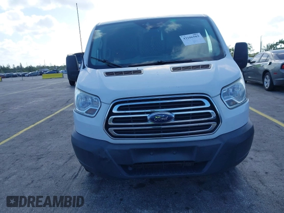 2017 Ford Transit with VIN 1FTYR1ZM2HKA78445, listed as a IAAI auction lot 42106503 with 143,544 mi miles and . Bid and sale history available at DreamBid. Image 12.
