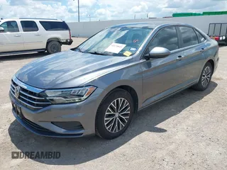 2019 Volkswagen Jetta S z VIN 3VWC57BUXKM061537, wystawiony jako IAAI lot #42170921 z przebiegiem 88 476 mil mil oraz . Historia ofert i sprzedaży dostępna na DreamBid. Obrazek 18.
