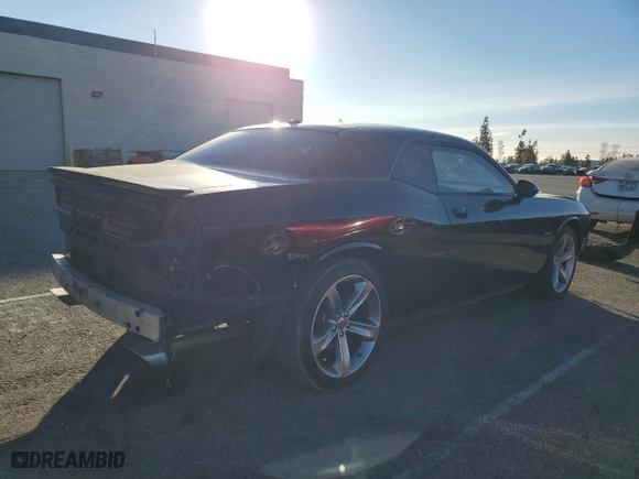 2015 Dodge Challenger R/T with VIN 2C3CDZAT7FH927410, listed as a Copart auction lot 88808965 with 85,949 mi miles and Salvage Title. Bid and sale history available at carsss.com. Image 3.