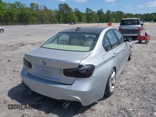 2013 BMW 3 Series 328i with VIN WBA3A5C57DF356069, listed as a IAAI auction lot 42078635 with 140,669 mi miles. Bid and sale history available at carsss.com. Image 4.