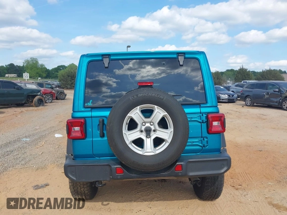 2020 Jeep Wrangler Unlimited Sport z VIN 1C4HJXDG4LW331133, wystawiony jako IAAI lot #42154246 z przebiegiem 87 668 mil mil oraz . Historia ofert i sprzedaży dostępna na DreamBid. Obrazek 16.