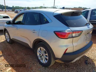 2020 Ford Escape SE with VIN 1FMCU0G6XLUC54979, listed as a IAAI auction lot 42223043 with 52,770 mi miles and . Bid and sale history available at DreamBid. Image 3.