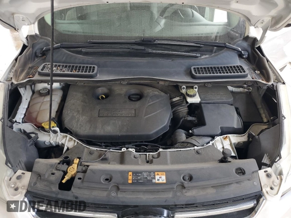 2013 Ford Escape SEL с VIN 1FMCU0H91DUB90163, выставлен на аукционе Copart как лот 64091785 с пробегом 156 038 миль миль и Списание • Salvage title. История ставок и продаж доступна на DreamBid. Изображение 12.
