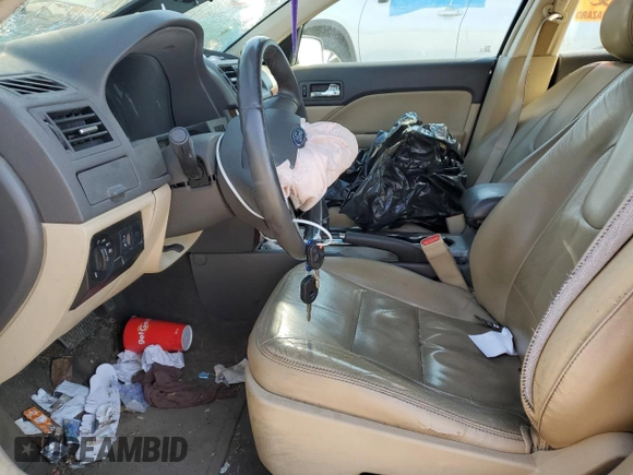 2012 Ford Fusion SEL z VIN 3FAHP0JAXCR192513, wystawiony jako Copart lot #48873205 z przebiegiem 163 110 mil mil oraz Szkoda całkowita • Salvage title. Historia ofert i sprzedaży dostępna na DreamBid. Obrazek 7.