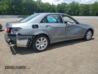 2013 Mercedes-Benz E 350 Luxury with VIN WDDHF8JBXDA721657, listed as a Copart auction lot 63260475 with 49,357 mi miles and Salvage title. Bid and sale history available at DreamBid. Image 3.