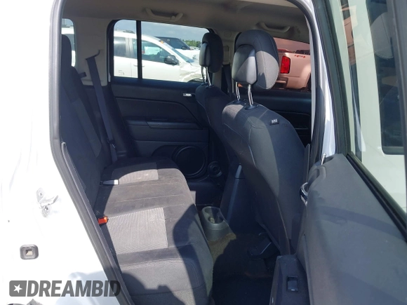 2014 Jeep Patriot Sport with VIN 1C4NJPBA8ED772974, listed as a IAAI auction lot 42401827 with 140,761 mi miles and . Bid and sale history available at DreamBid. Image 8.