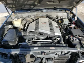 2006 Lexus LX 470 z VIN JTJHT00W664007502, wystawiony jako Copart lot #47871885 z przebiegiem 172 552 mil mil oraz Szkoda całkowita • Salvage title. Historia ofert i sprzedaży dostępna na DreamBid. Obrazek 12.