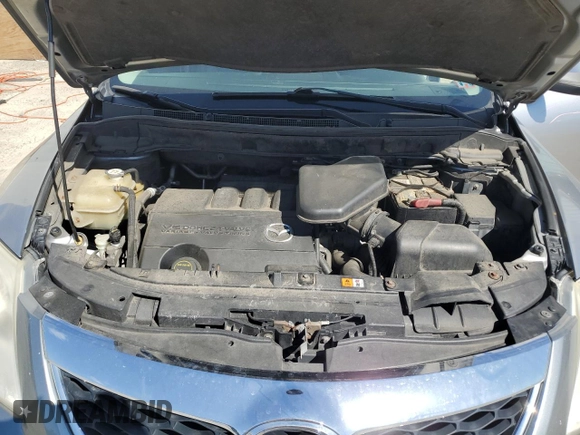 2012 Mazda CX-9 Grand Touring z VIN JM3TB3DV3C0335330, wystawiony jako Copart lot #57562015 z przebiegiem 171 397 mil mil oraz Szkoda całkowita • Salvage title. Historia ofert i sprzedaży dostępna na DreamBid. Obrazek 12.