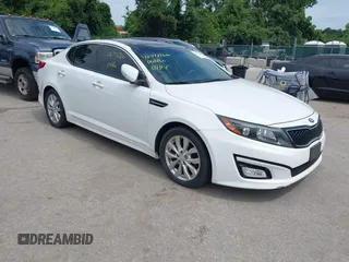 2015 Kia Optima EX z VIN 5XXGN4A77FG452747, wystawiony jako IAAI lot #42772766 z przebiegiem 97 243 mil mil oraz . Historia ofert i sprzedaży dostępna na DreamBid. Obrazek 1.