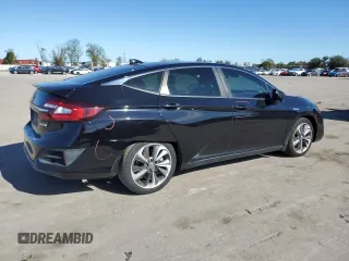 2018 Honda Clarity with VIN JHMZC5F1XJC011632, listed as a Copart auction lot 71693242 with 137,475 mi miles. Bid and sale history available at carsss.com. Image 3.