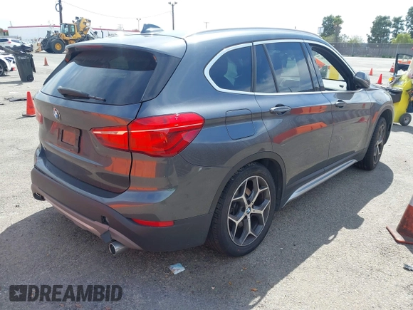2018 BMW X1 xDrive28i with VIN WBXHT3C30J5L34702, listed as a IAAI auction lot 41935803 with 42,174 mi miles. Bid and sale history available at carsss.com. Image 4.
