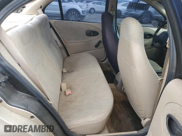 1999 Saturn SL z VIN 1G8ZH5280XZ178863, wystawiony jako Copart lot #73660474 z przebiegiem 195 738 mil mil oraz Szkody całkowita. Historia ofert i sprzedaży dostępna na DreamBid. Obrazek 10.
