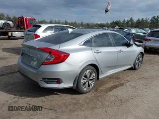 2018 Honda Civic EX-T z VIN 2HGFC1F34JH641837, wystawiony jako IAAI lot #41858089 z przebiegiem 65 318 mil mil oraz . Historia ofert i sprzedaży dostępna na DreamBid. Obrazek 4.