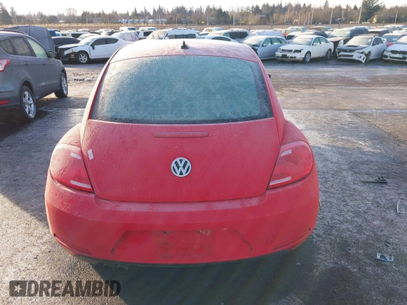 2014 Volkswagen Beetle 2.5L w/Sun with VIN 3VWJP7AT8EM629573, listed as a IAAI auction lot 41479054 with 73,950 mi miles and . Bid and sale history available at DreamBid. Image 16.