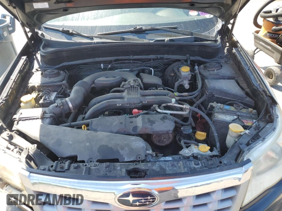 2012 Subaru Forester X Premium with VIN JF2SHADC9CH463273, listed as a Copart auction lot 56579405 with 164,887 mi miles and Salvage title. Bid and sale history available at DreamBid. Image 12.