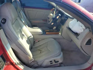2004 Cadillac XLR z VIN 1G6YV34A945603839, wystawiony jako Copart lot #47592565 z przebiegiem Nie podano mil oraz Szkody całkowita. Historia ofert i sprzedaży dostępna na DreamBid. Obrazek 10.