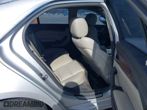 2015 Cadillac CTS RWD with VIN 1G6AP5SX5F0115745, listed as a IAAI auction lot 41658935 with 62,477 mi miles and . Bid and sale history available at DreamBid. Image 8.